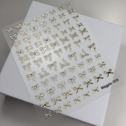 Sticker 209 - gold bows